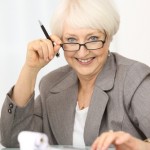 Businesswoman mature with calculator